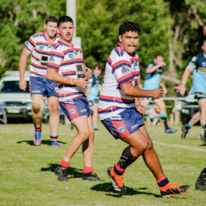 Three footy players.
