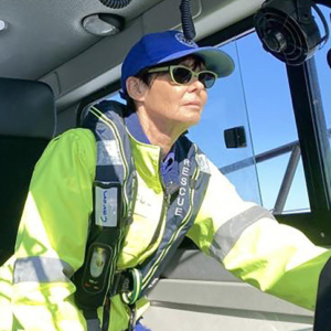 Caron Parfitt in uniform in the Marine Rescue vessel in