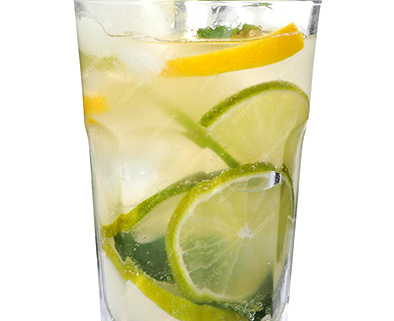 A glass filled with clear liquid and slices of lemon and lime