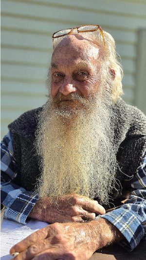 Portrait photo of man with a beard.