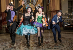 Four people in costumes