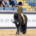 Person riding a pony in competition