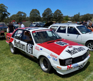 Classic car with Marlborough advertising