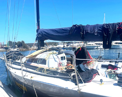 Yacht moored to pier.