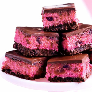 A stack of bright pink chocolate covered cherry ripe slices