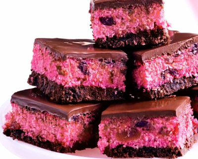A stack of bright pink chocolate covered cherry ripe slices