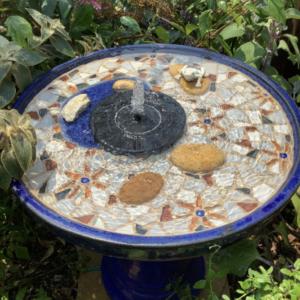 A water feature with a water fountain
