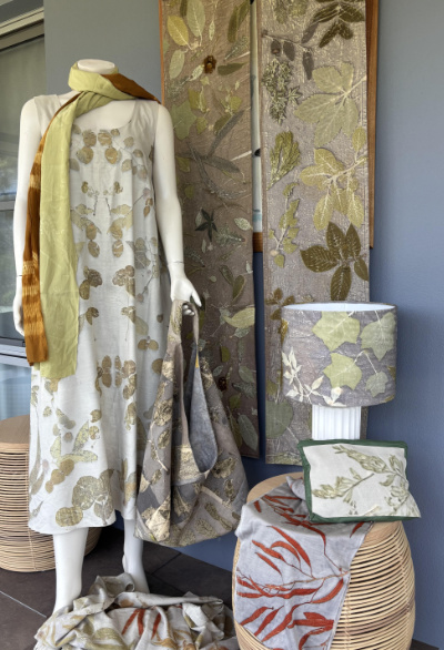 An array of fabric articles with botanical themed designs
