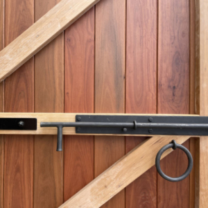 Latch of a hand-crafted wooden door.