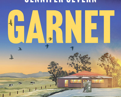 Garnet cover with a painting of petrol station in an Australian landscape.