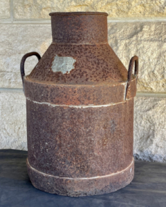 Rusted cream can