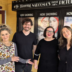 Group of people in front of a cinema