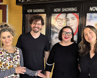Group of people in front of a cinema