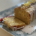 Frosted lemon cake with zest on top
