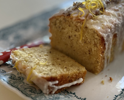Frosted lemon cake with zest on top