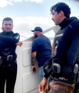 Group of men on a boat