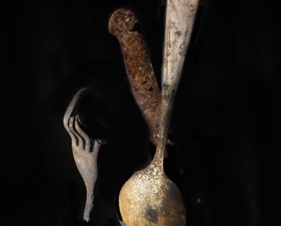Close up of burned, warped cutlery