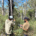 Two. men working in the bush.