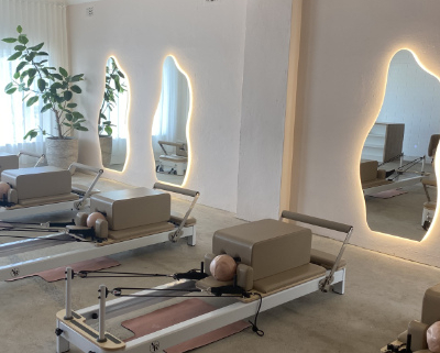Pilates studio with four reformers.