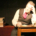 Man leaning on elbow at a table