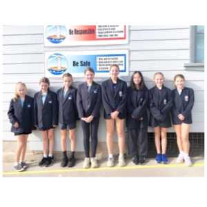 Group of young people in their school uniforms
