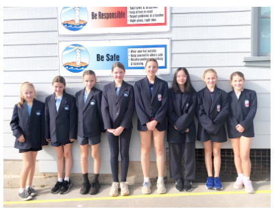 Group of young people in their school uniforms