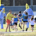 Children on a sports oval with two people dressed as Bananas in Pyjamas