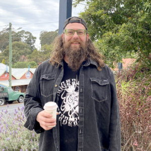 Man with drink in his hand