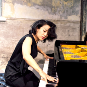Woman playing the piano.