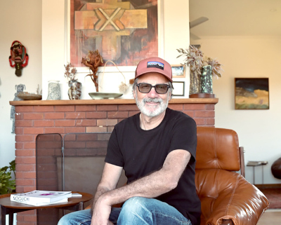 Man sitting in a leather chair.