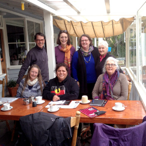 Group of people around a table.